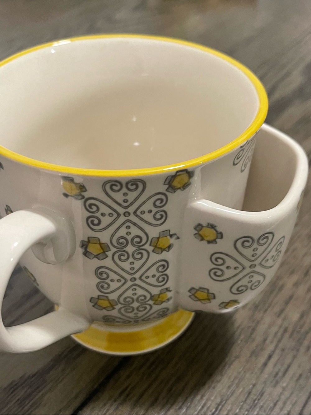 Cup with built-in tea bag holders